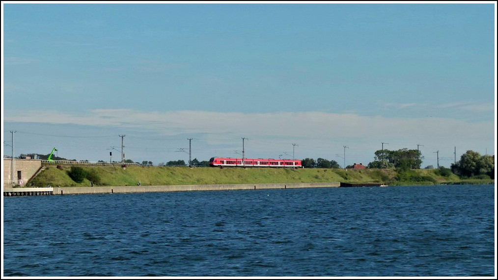 A DB Flirt is running on the Rgendamm between Altefhr and Stralsund on September 20th, 2011. 