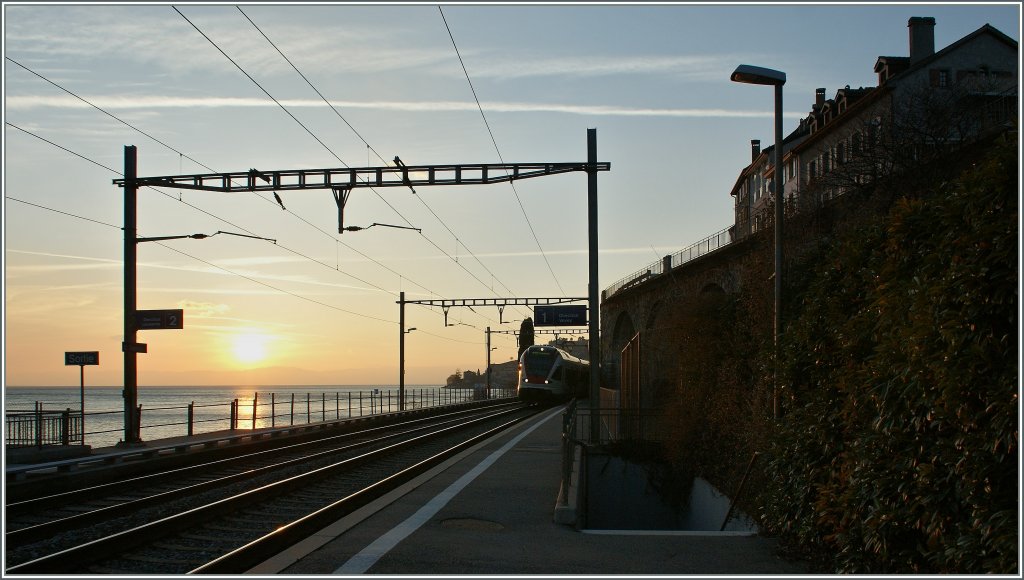 A Flirt is approaching the St Saphorin Station. 
11.03.2012