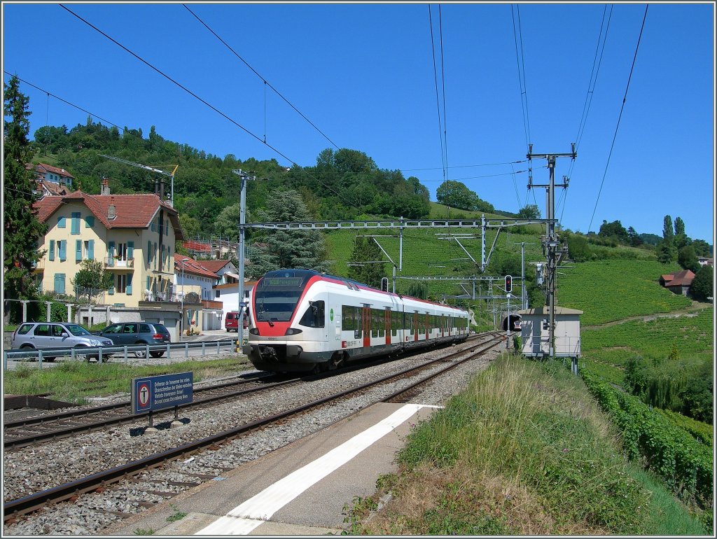 A Flirt to Palezieux is leaving Grandvaux. 
17.07.2012