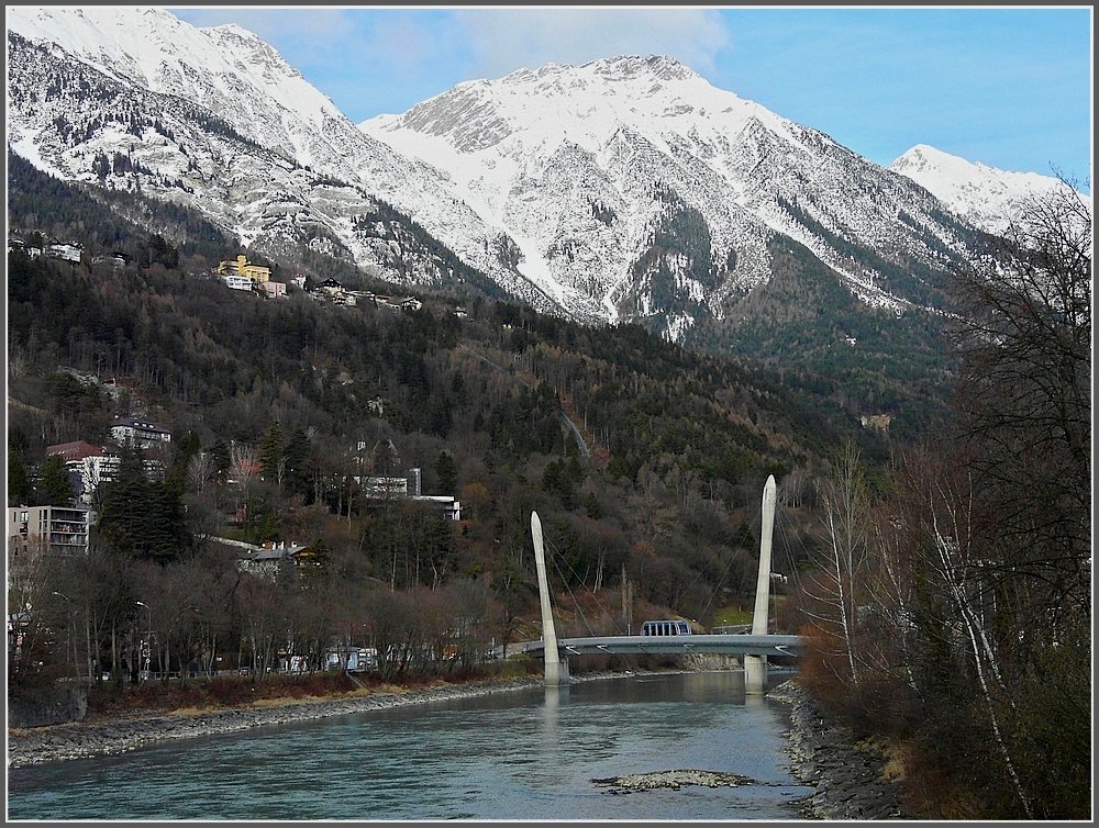 A Hungerburgbahn train is crossing the Inn bridge at Innsruck on December 22nd, 2009.