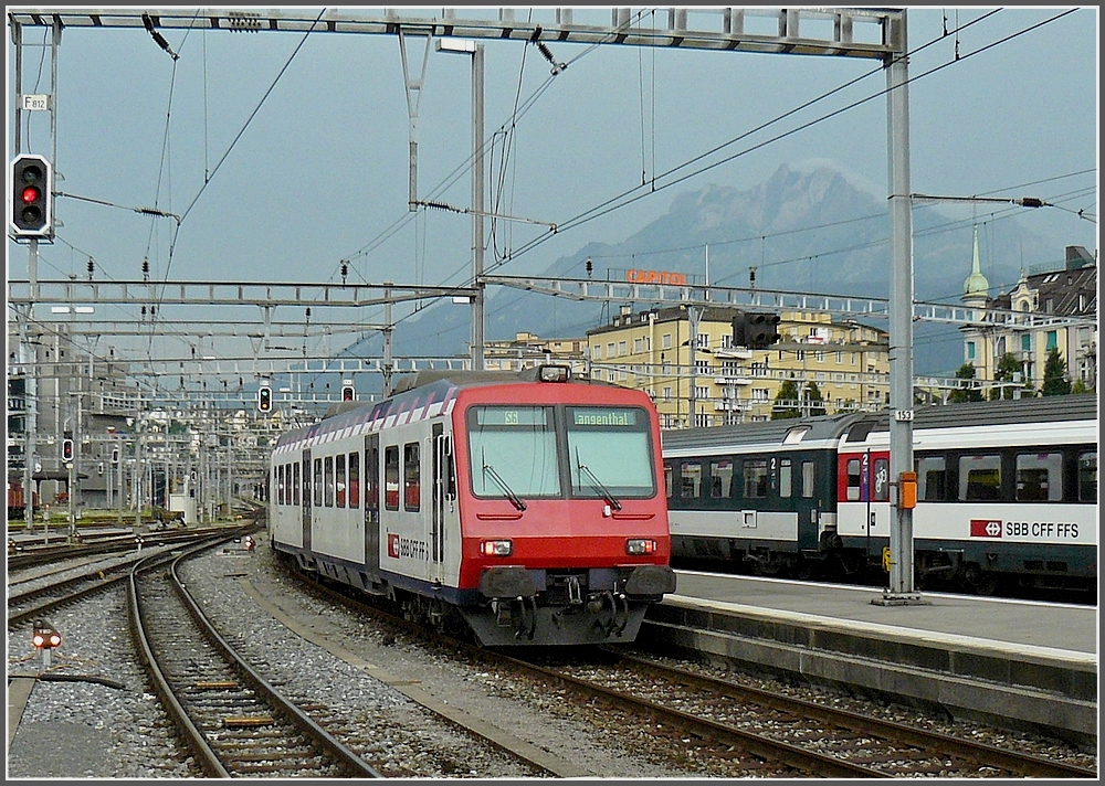 A local train to Langenthal is leaving the station of Luzern on July 30th, 2008.