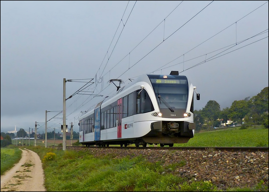 A local train to Singen (Hohentwiel) is running through Bietingen on September 17th, 2012.