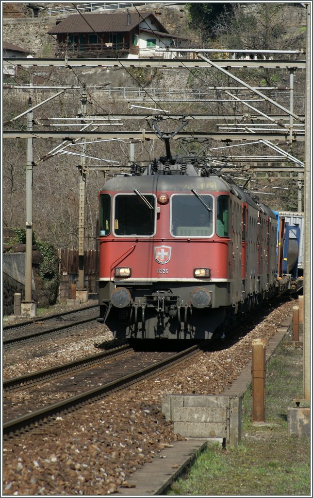 A lot of Locomotives arriving at the old Giornico Station: two Re 4/4 II and two Re 6/6. 
03.04.2013