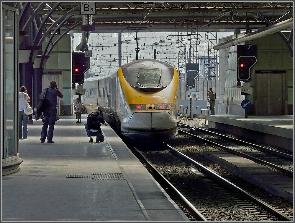 A lot of photographers are making pictures from the Eurostar unit leaving the station Bruxelles Midi on May 30th, 2009. 