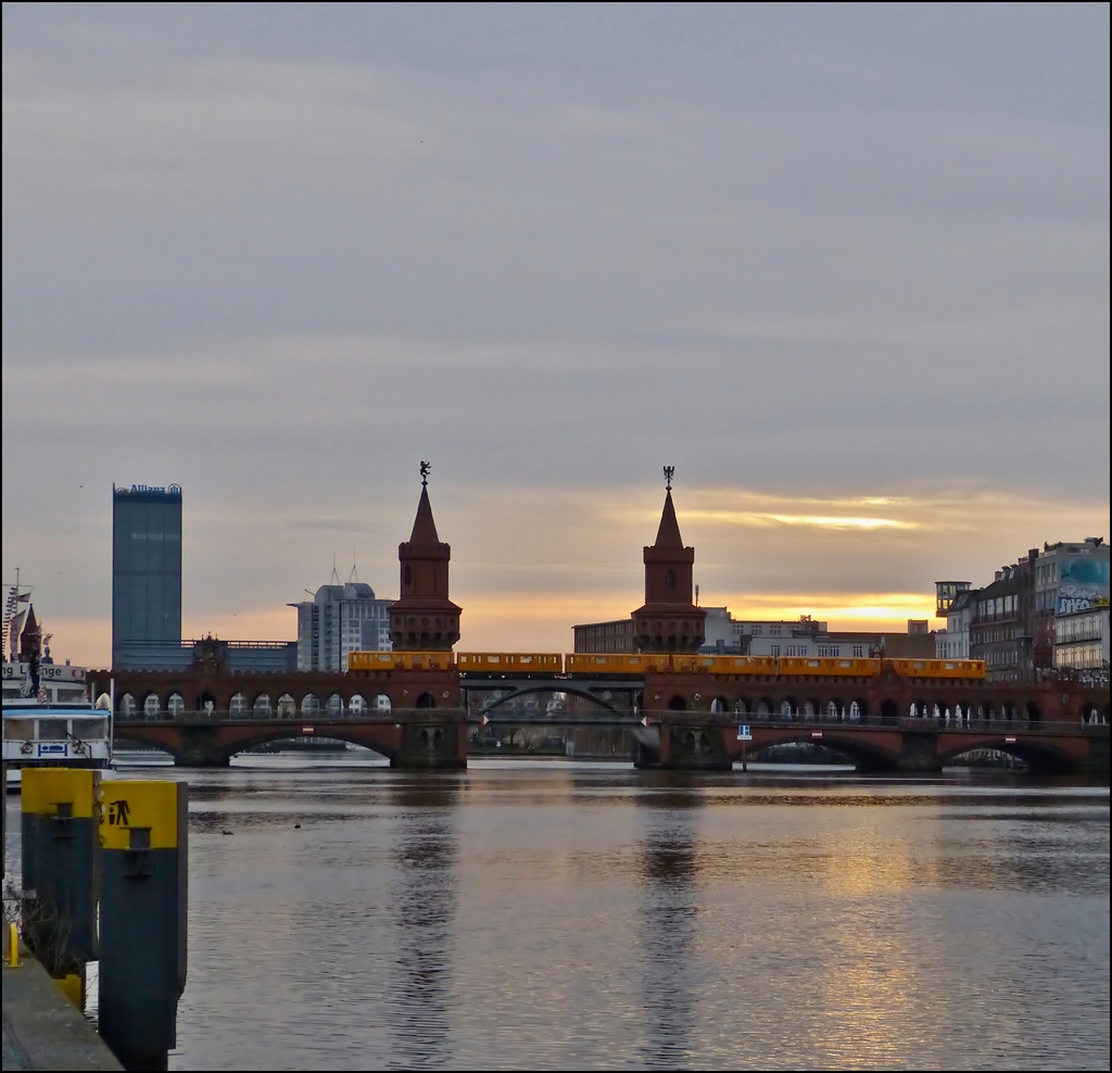 A metro train of the U 1 is running on the Oberbaumbrcke in Berlin on December 25th, 2012.