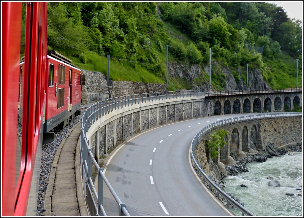 A MGB Regio is running along the Rhone between Mrel and Betten on May 23rd, 2012.