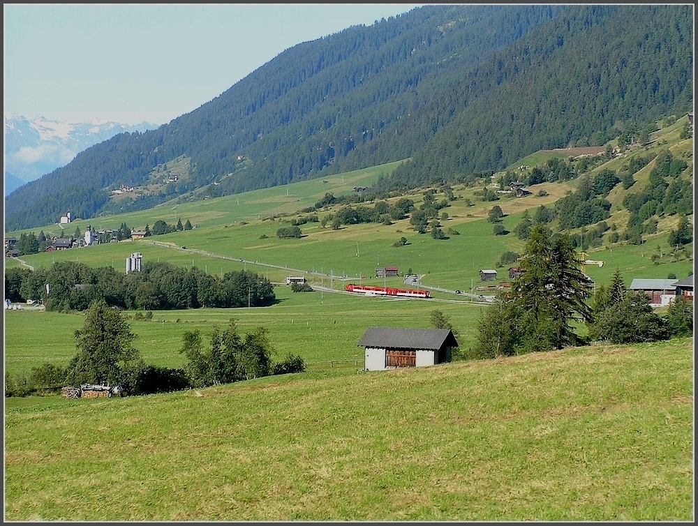 A MGB train is running through the Rhne valley (Upper-Goms) on August 4th, 2007.