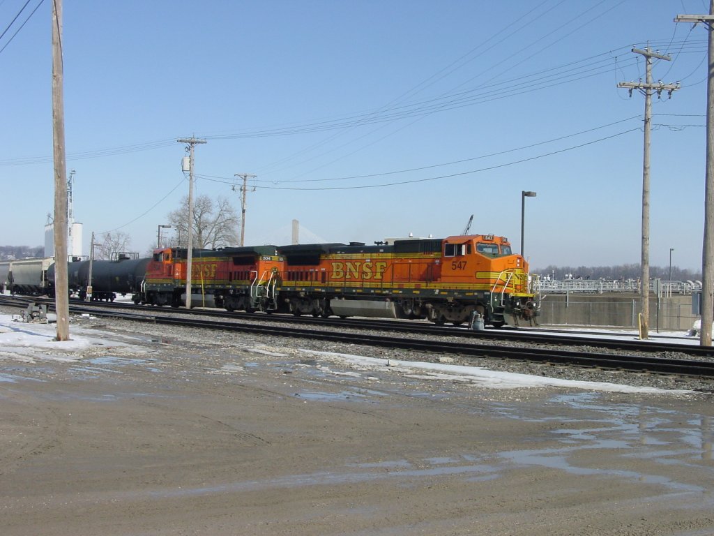 A pair of ex-Santa Fe BNSF diesel loks perform switching duty in the Burlington, Iowa yard, 3 Mar 2010.