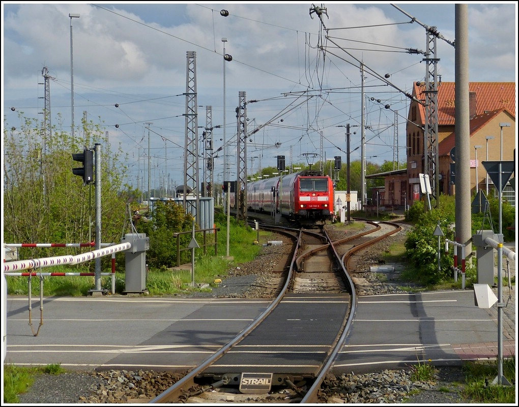 A RE to Norddeich Mole is leaving the station of Norddeich on May 11th, 2012.