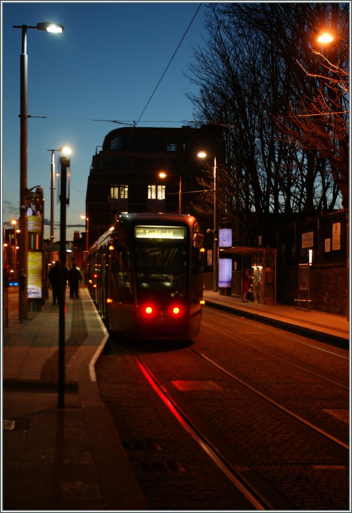 A  redline  LUAS on the way to west by the Smithfield Stop. Dublin, 25.04.2013