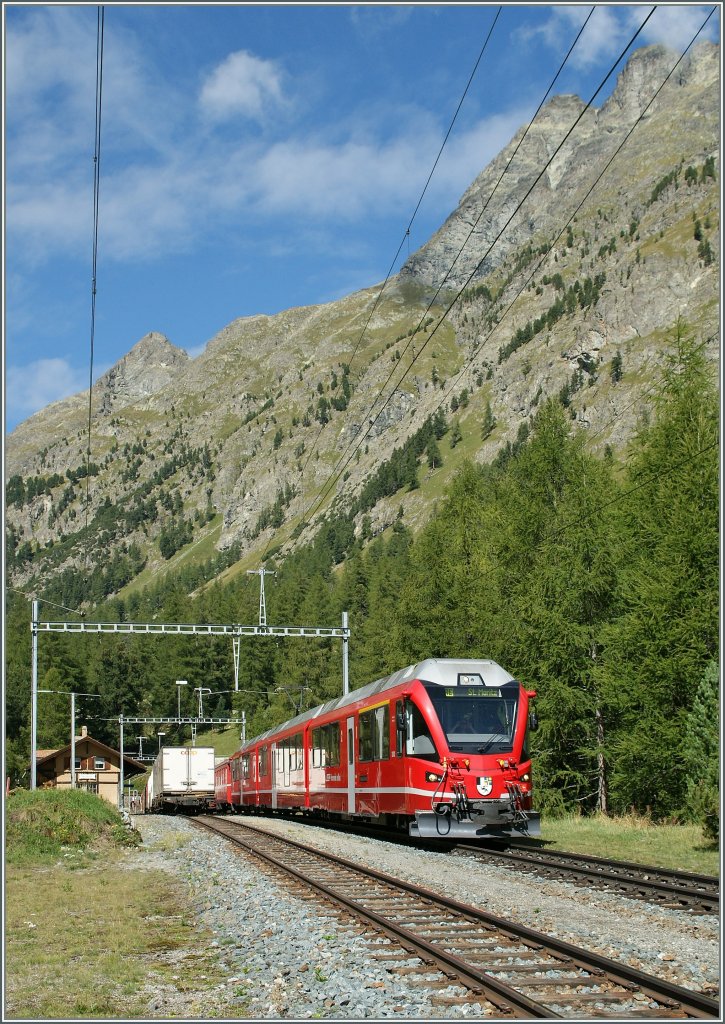 A RhB  Allegra  with his Albula fast train to St.Moritz is crossing a Cargo-train n the Spinas Station.
12.09.2011