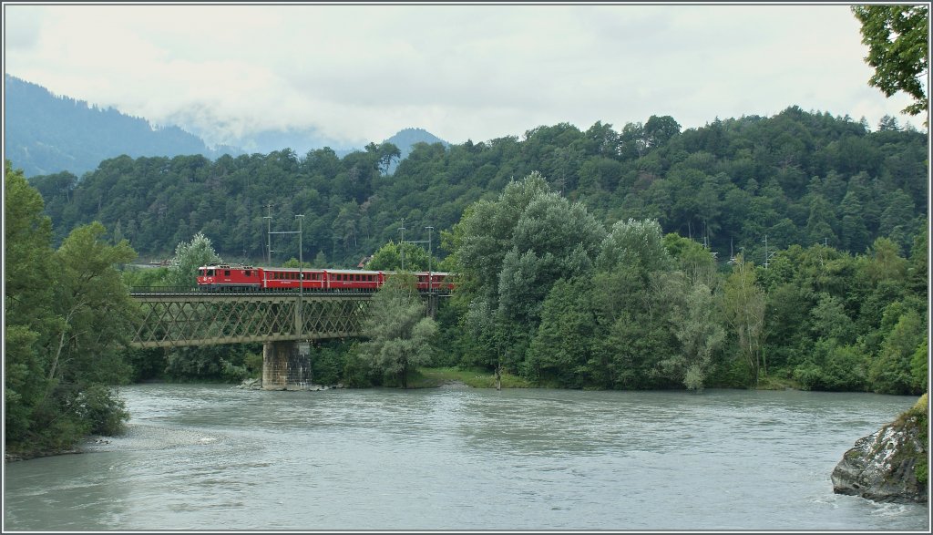 A RhB Ge 4/4 II on the Rhein Bridge by Reichenau. 
13. 08.2010