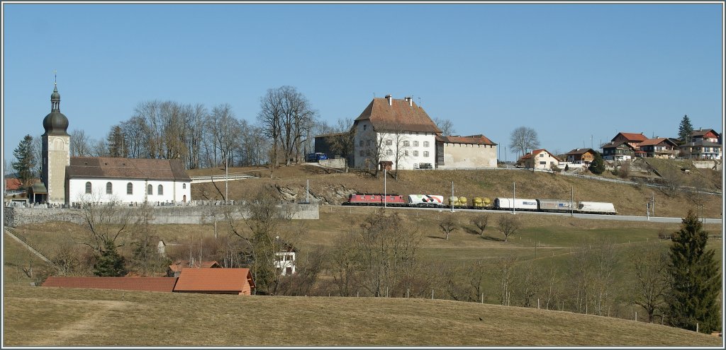 A SBB Re 6/6 wiht a cargo train by Vaulruz. 
14.03.2012