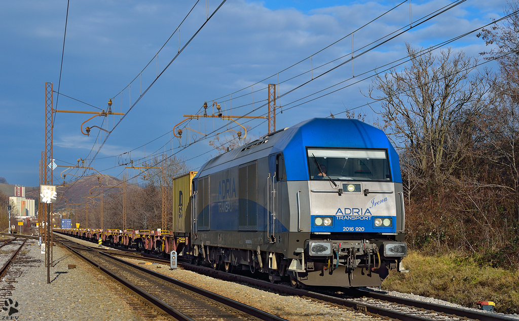 ADRIA Transport diesel loc 2016 920 'Irena' is hauling container train through Maribor-Tabor on the way to port Koper. /3.1.2013