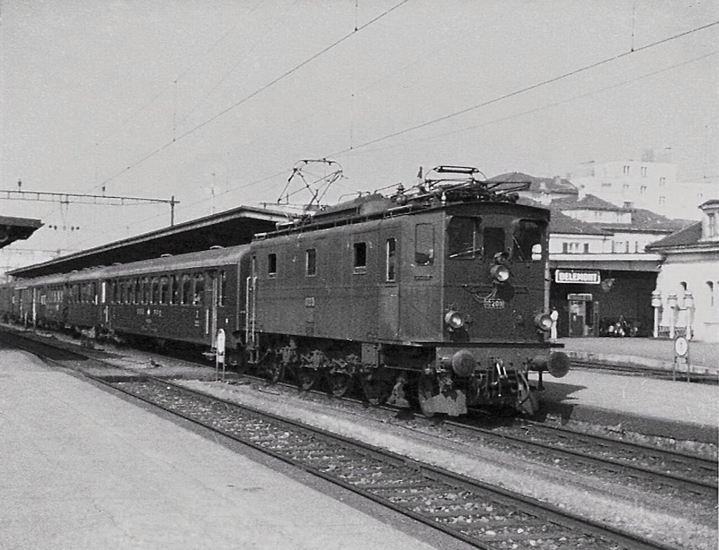 Ae 3/5 with a local train in Delemont. 
(ca 1979/scanned analog picture)