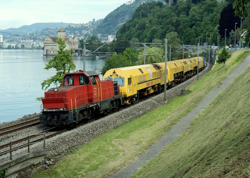 Am 841 038-3 with a special cargo track service train by the castle of Chillon. 08.06.2010.