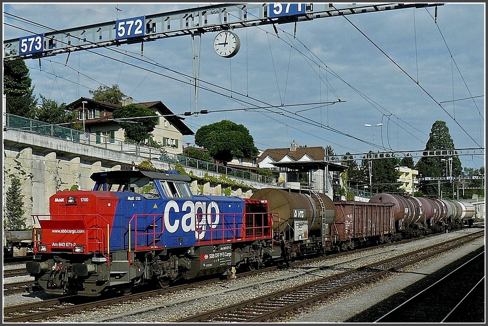 Am 843 071-2 is hauling a goods train through the station of Spiez on July 31st, 2008.
