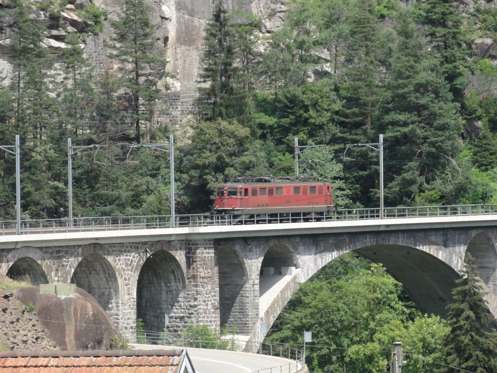 An Ae 6/6 drives back from poking service to Erstfeld, Wassen, 06.07.2011