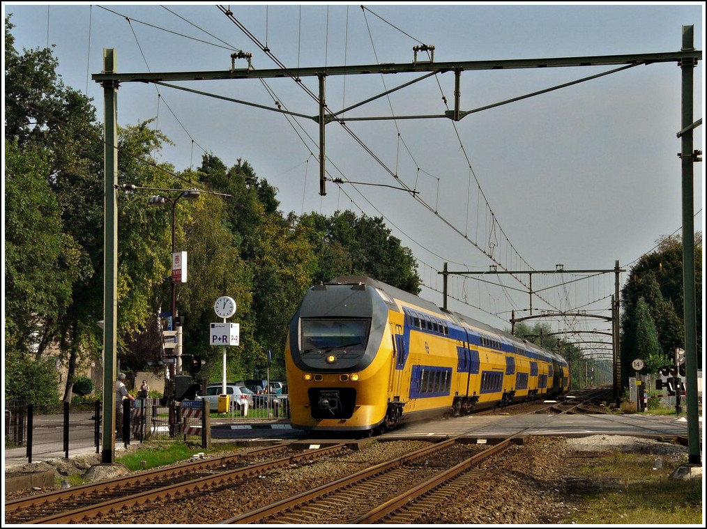 An IRM Regiorunner unit is running through the station of Oudenbosch on September 3rd, 2011.