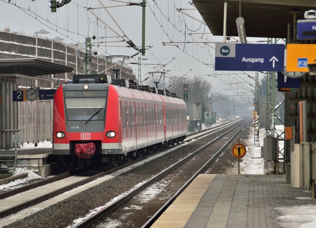 An S11 stoptrain at the station of Allerheiligen, it leaded by the class 423 196 on it's way to Bergisch Gladbach