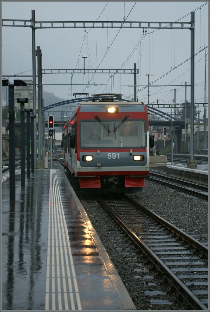 AOMC BDe 4/8 591 is arriving on Aigle. 
19.03.2011