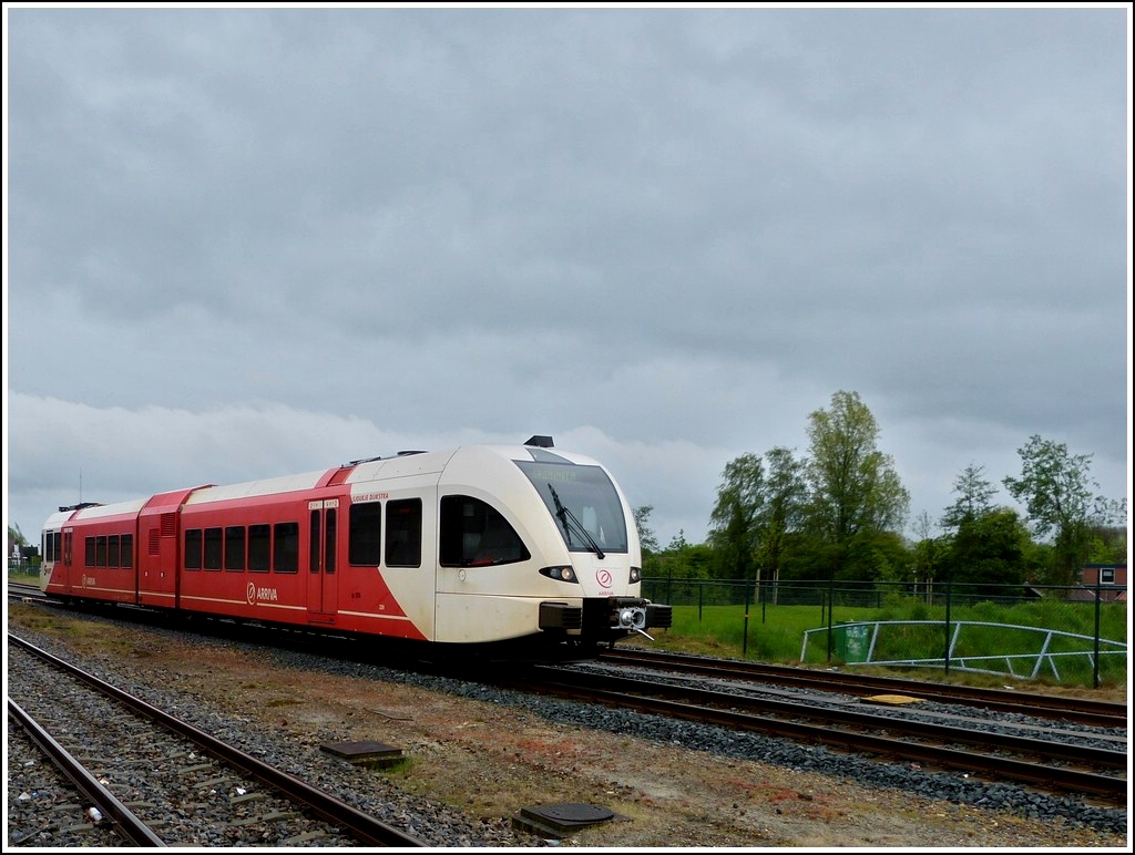 Arriva Diesel GTW 2/8A 229 as local train to Groningen is arriving in Windschoten on May 10th, 2012.