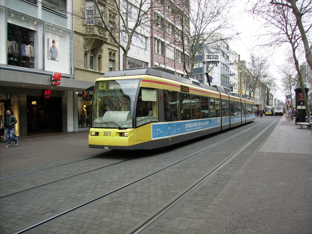 At the 16.02.2011 is tramcar 301 on line 4 on the way to the urban forest of Karlsruhe, as he drives in the royal road.
