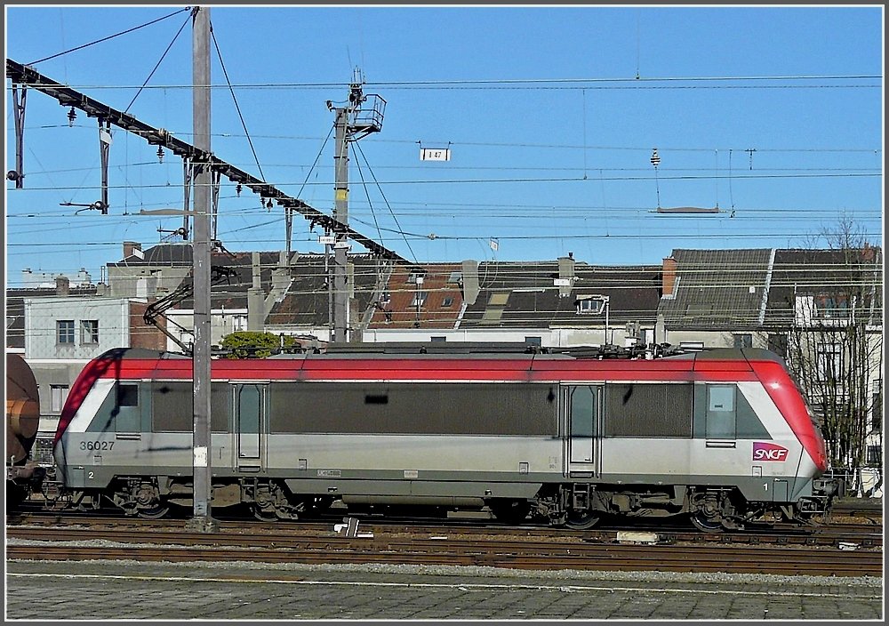 BB 36027 is running through the station Gent Sint Pieters on Feruary 14th, 2009.