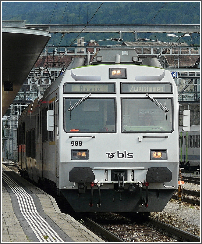 BLS RBDe 565 988  White Bull  as local train to Zweisimmen is leaving the station of Spiez on July 29th, 2008.