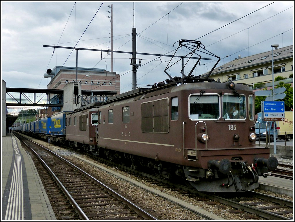 BLS Re 4/4 double header is hauling a freight train through the station of Spiez on May 22nd, 2012.