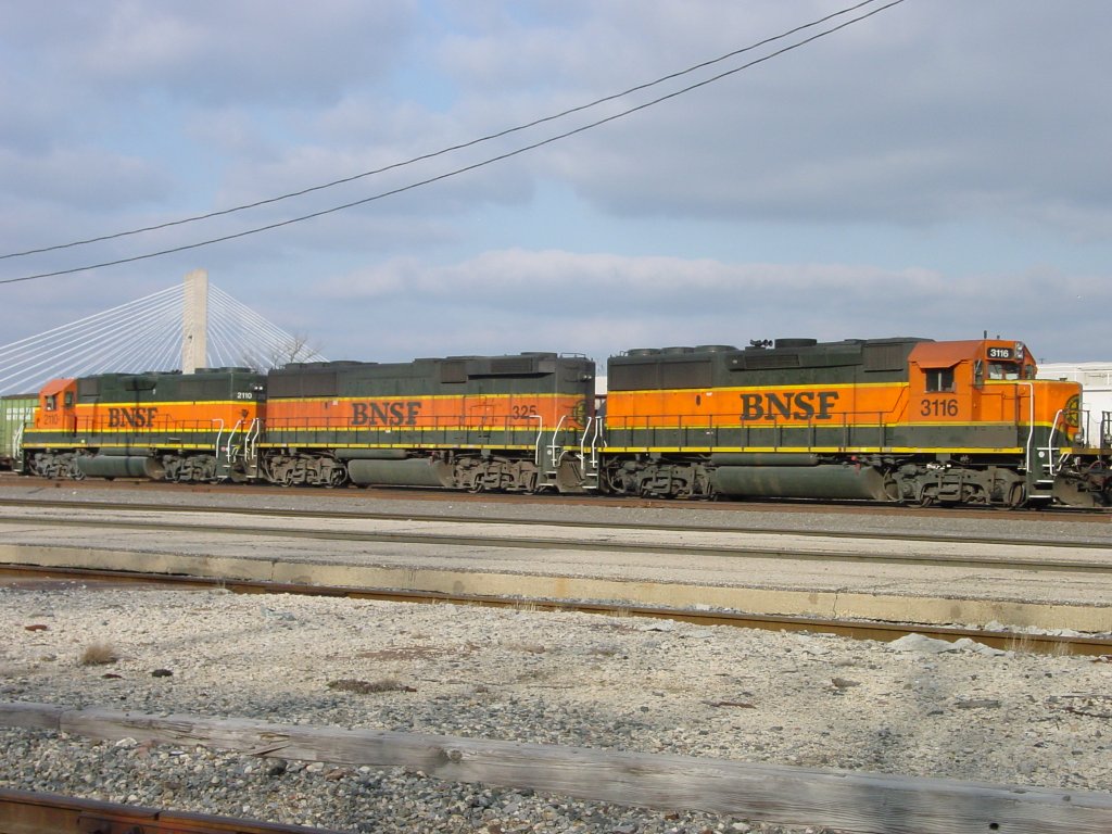 BNSF 2110, 325 and 3116 sit at the Burlington, Iowa yard on 6 Mar 2006.
