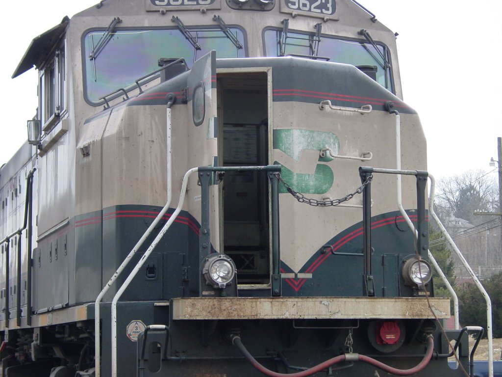 Burlington Northern SD70MAC number 9623 sits at the Burlington, Iowa depot with its front door open on 27 Feb 2006.