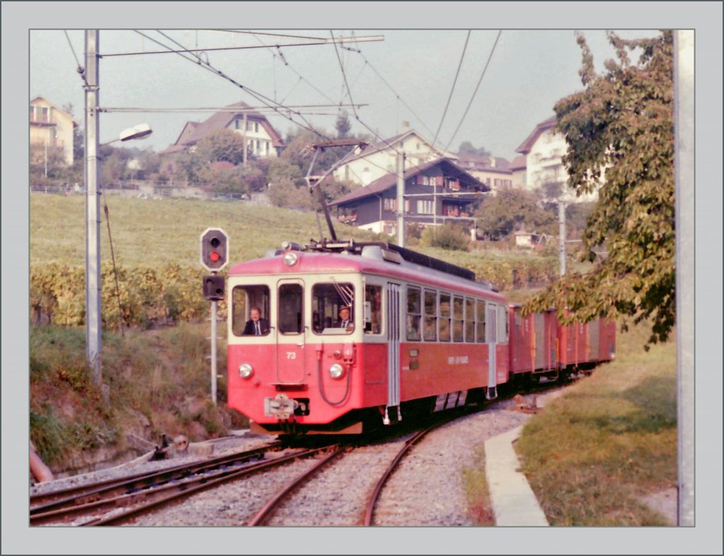 CEV BDeh 2/4 N 73 with two Gk is arriving at St Legier Station (Scanned negative/Summer 1985)

