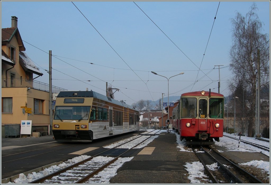 CEV  GTW Be 2/6 7003 and Bt 222 (with BDeh 2/4) in Blonay. 
11.02.2012