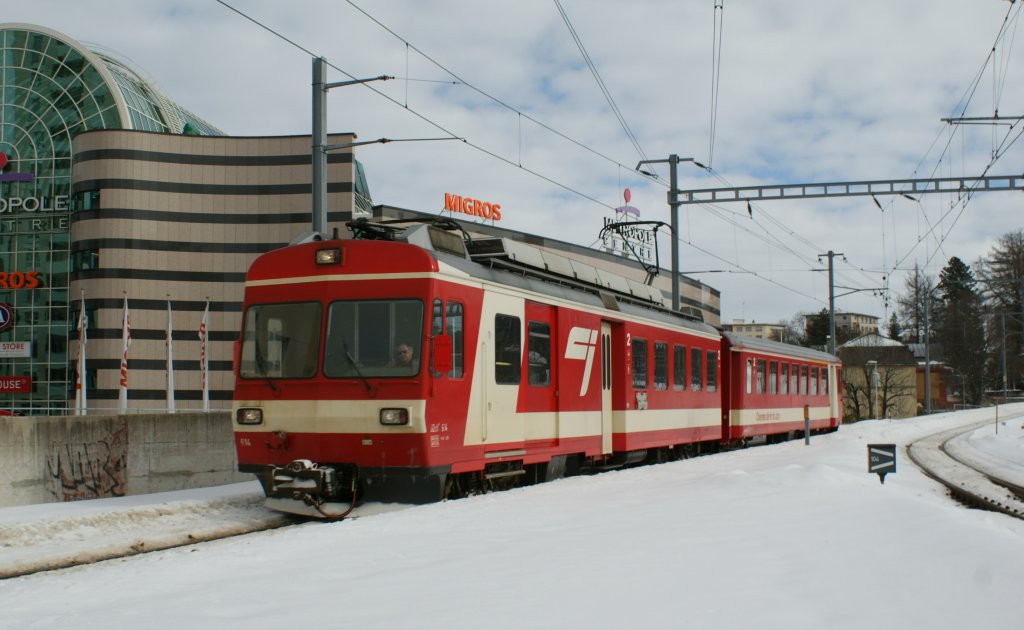 CJ local train is arriving at La Chaux-de-Fonds. 
16.02.2010