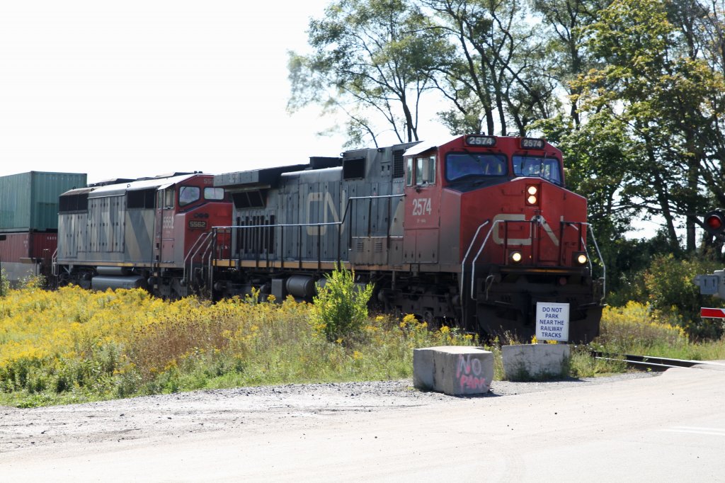 CN Dash 9-44CWL 2574 and SD60F 5562 with freight train at the eastside of Toronto on  13.Sept.2010.