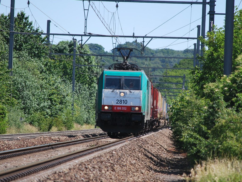 Container train coming from Germany past Warsage on line 24 in June 2011.