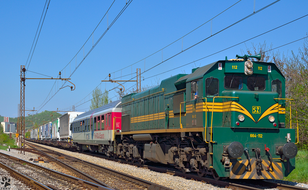Diesel loc 664-112 pull ROLA-train through Maribor-Tabor on the way to Tezno yard. /25.4.2013