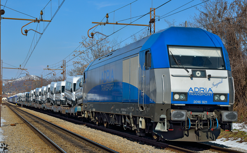 Diesel loc ADRIA 2016 921 'Ingrid' pull freight train through Maribor-Tabor on the way to Koper port. /2.3.2013