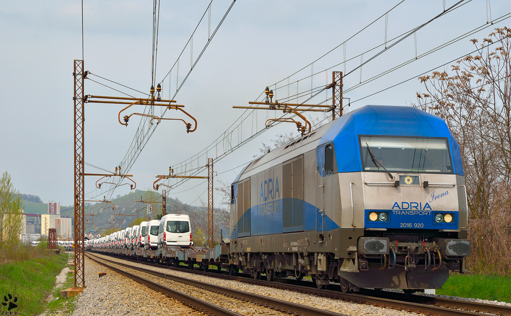 Diesel loc ADRIA 9016 920 'Irena' is hauling VW van train through Maribor-Tabor on the way to Koper port. /20.4.2013