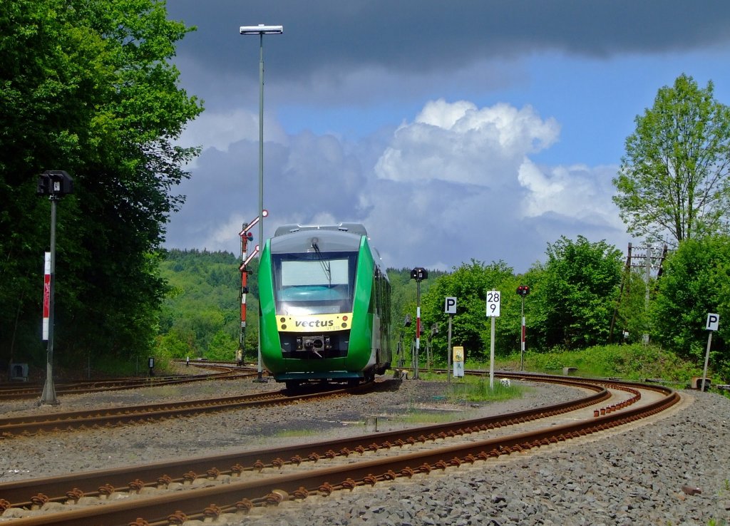 Diesel multiple units VT 210 (a CORADIA LINT 27) of the Vectus traffic ltd goes on 30/05/2010 from station Westerburg / Ww (Germany) direction Hachenburg and Altenkirchen on the upper Westerwaldbahn (KBS 461).