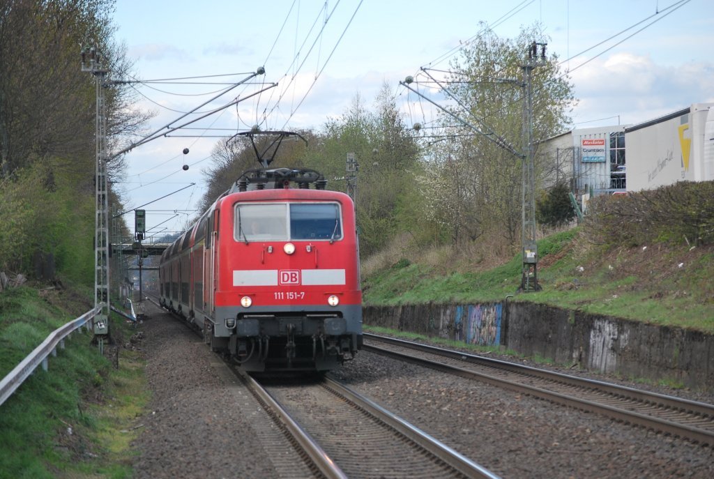 Electric engine 111 151-7 hauling Regionalexpress 4 Dortmund-Aachen past Kohlscheid (18th April 2012).