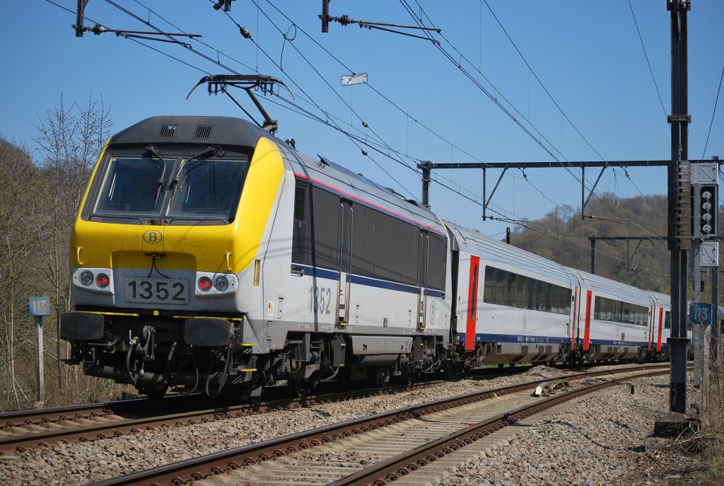 Electric engine N° 1352 pushing IC A Ostend-Eupen train on line 37 past Olne in April 2010.