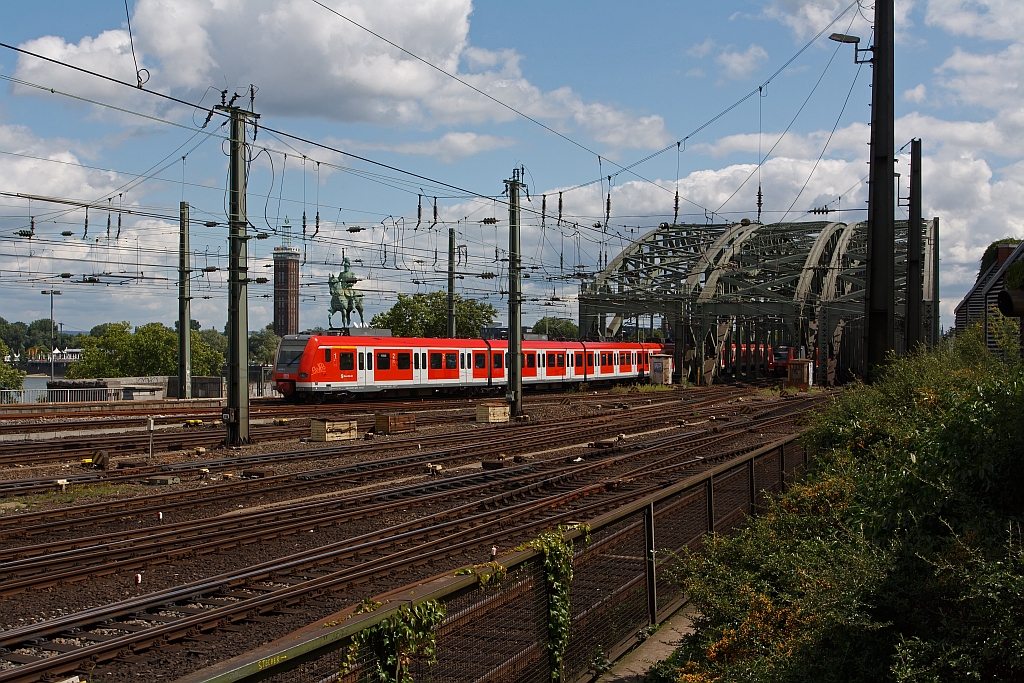 Electric multiple Unit ot the Class 423 of the S-Bahn Cologne runs on 07.08.2011 in Cologne across the Hohenzollern Bridge.