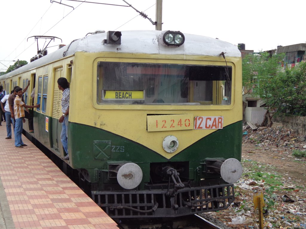 EMU 12240 is leaving Chetpet Station heading to Beach terminus.