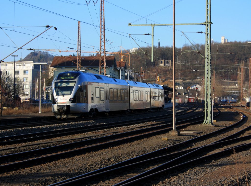 ET 23 007 (a 3-piece Stadler Flirt) of Abellio Rail NRW drives into  the railway station Siegen-Weisenau on 29.01.2011 . He travels the route Siegen-Hagen-Essen (RE 16 Ruhr-Sieg-Express). The three-part version of the FLIRT has a top speed of 160 km / h.