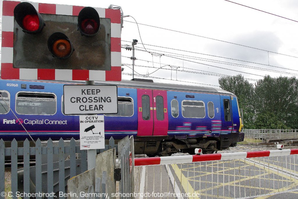 First Capital Connect (FCC) 365524 at Ely levelcrossing.
July 2010