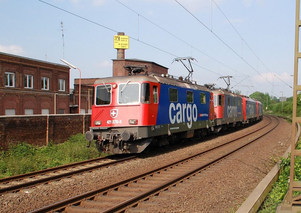 Four suisse electriclocomotives in Jchen/NRW been seen on the 7th of mai 2012, two of the class 421 and two of the class 474(cold) with two passangercars in there back.