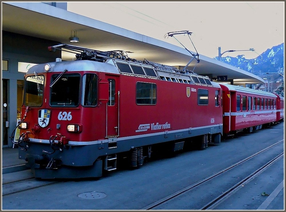 Ge 4/4 II 626  Malans  is waiting for passengers to Arosa at the station of Chur in the early morning of December 22nd, 2009. 