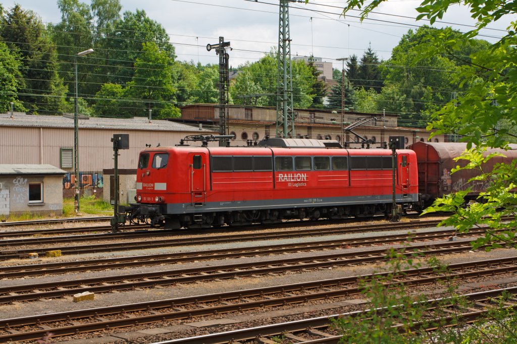 German electric locomotive 151 139-3 from the RAILION Logistics at the 28/05/2011 in Kreuztal (Germany). The locomotive have attached a freight train in the Marshalling yard and pulls is now it towards Hagen.
